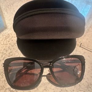 Women’s RĒVO Black Sunglasses with Case